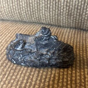 Inuit Person in a Canoe with a Seal Soapstone Sculpture